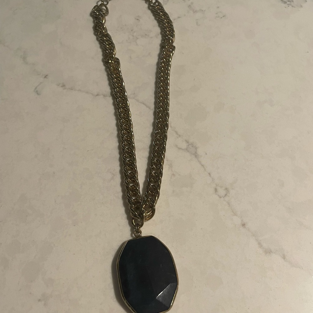 Necklace with green pendant. Costume jewelry.